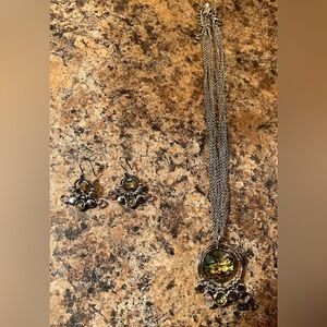 Silver necklace and earrings with stones